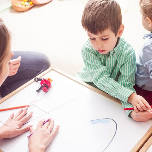 Image of a teacher and student at Peoria Private Preschool